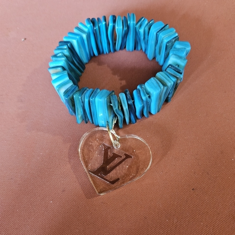 🖤🔥Rockin' Hot Originals Beautiful Turquoise Bracelet embellished with lv charm